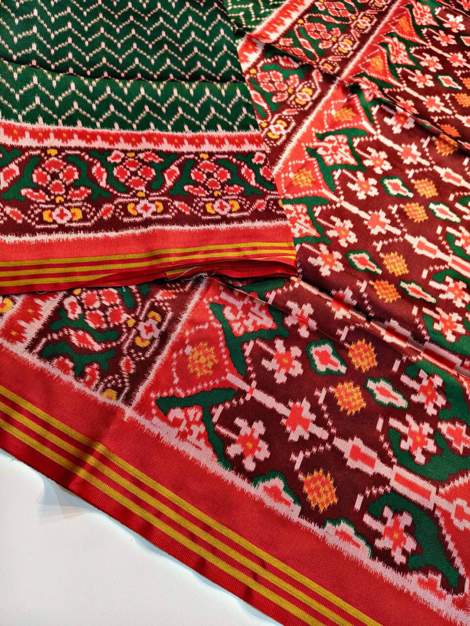 Ideal Dark Green Patola Lagdi Patta Saree With Desuetude Blouse Piece