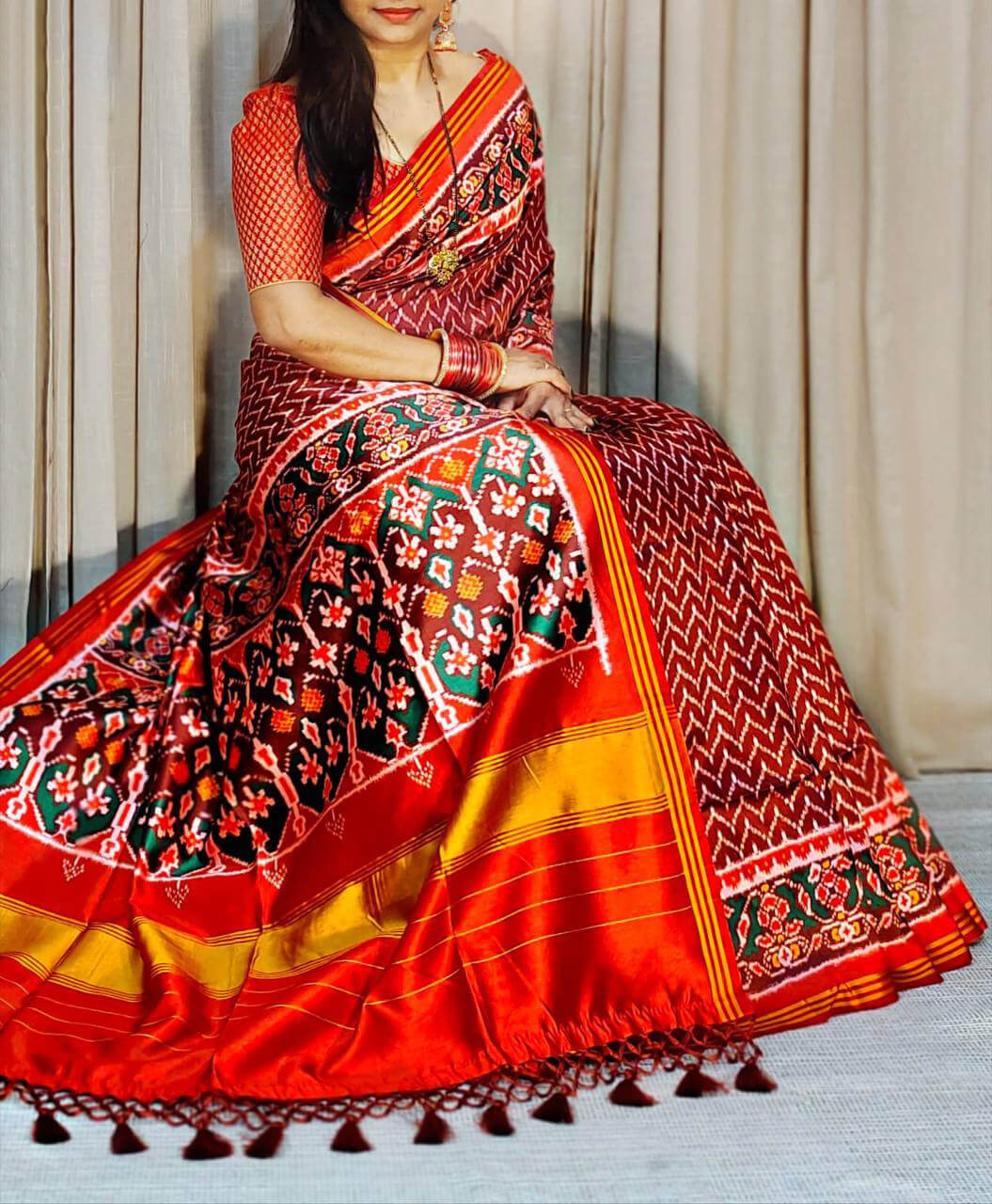 Ornate Maroon Patola Lagdi Patta Saree With Arresting Blouse Piece