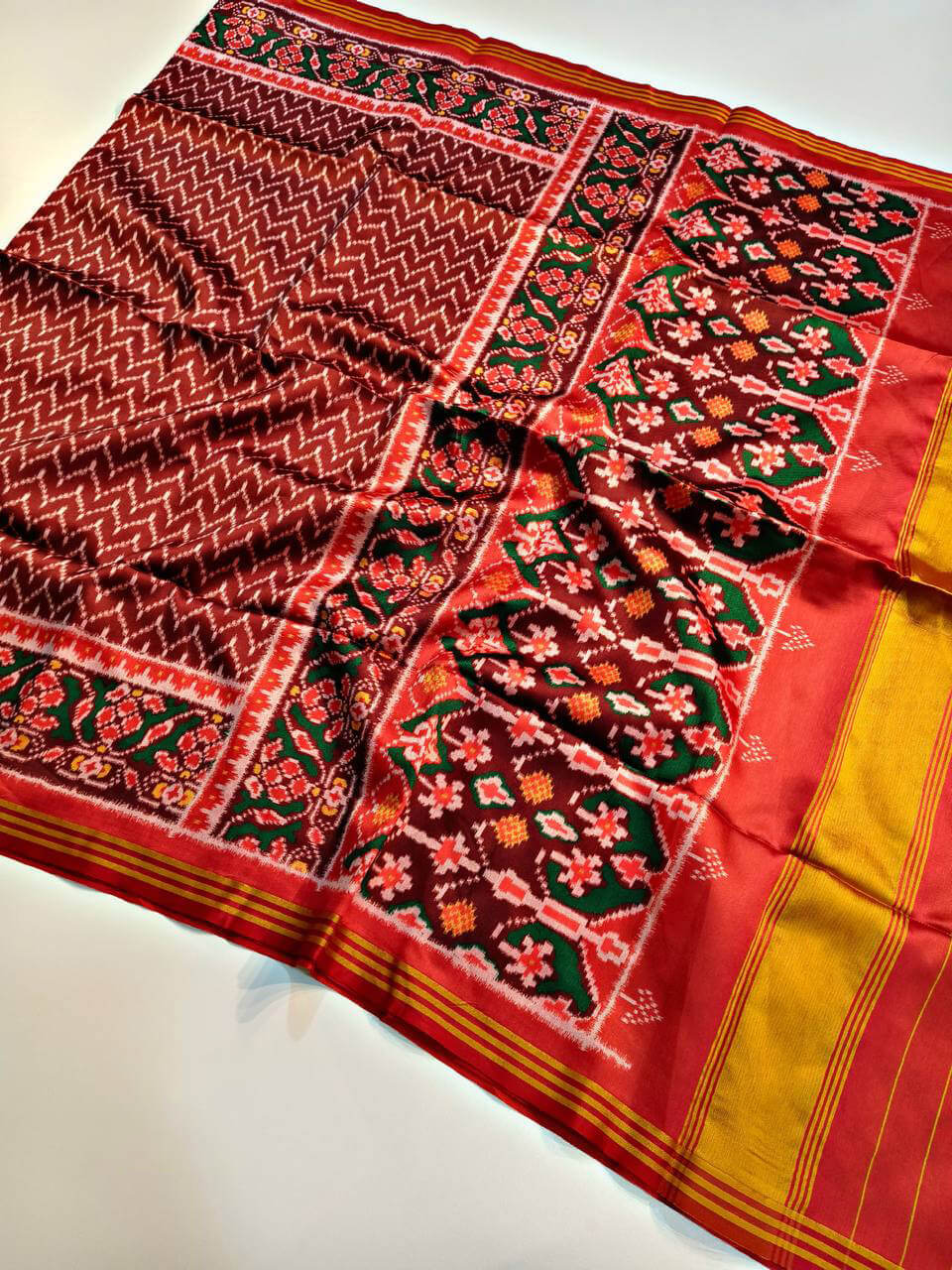 Ornate Maroon Patola Lagdi Patta Saree With Arresting Blouse Piece