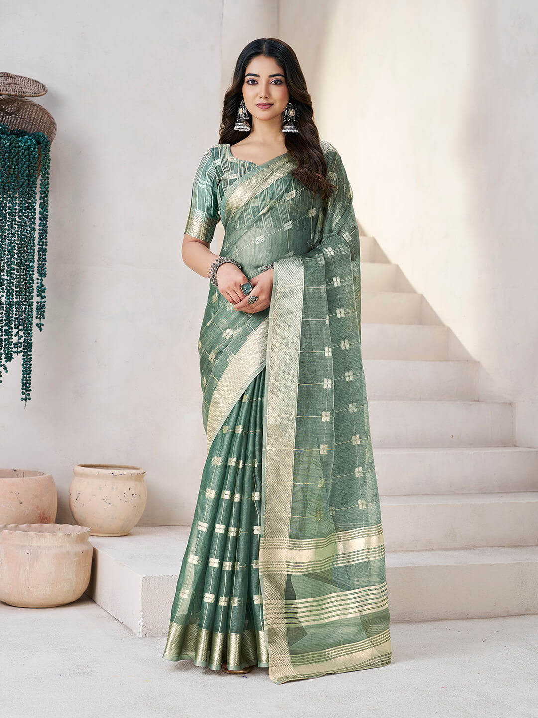 Flattering Green Zari Weaving Linen Silk Saree With Embrocation Blouse Piece