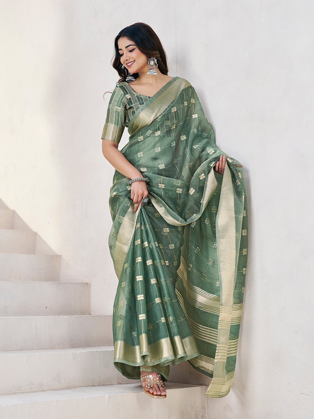 Flattering Green Zari Weaving Linen Silk Saree With Embrocation Blouse Piece