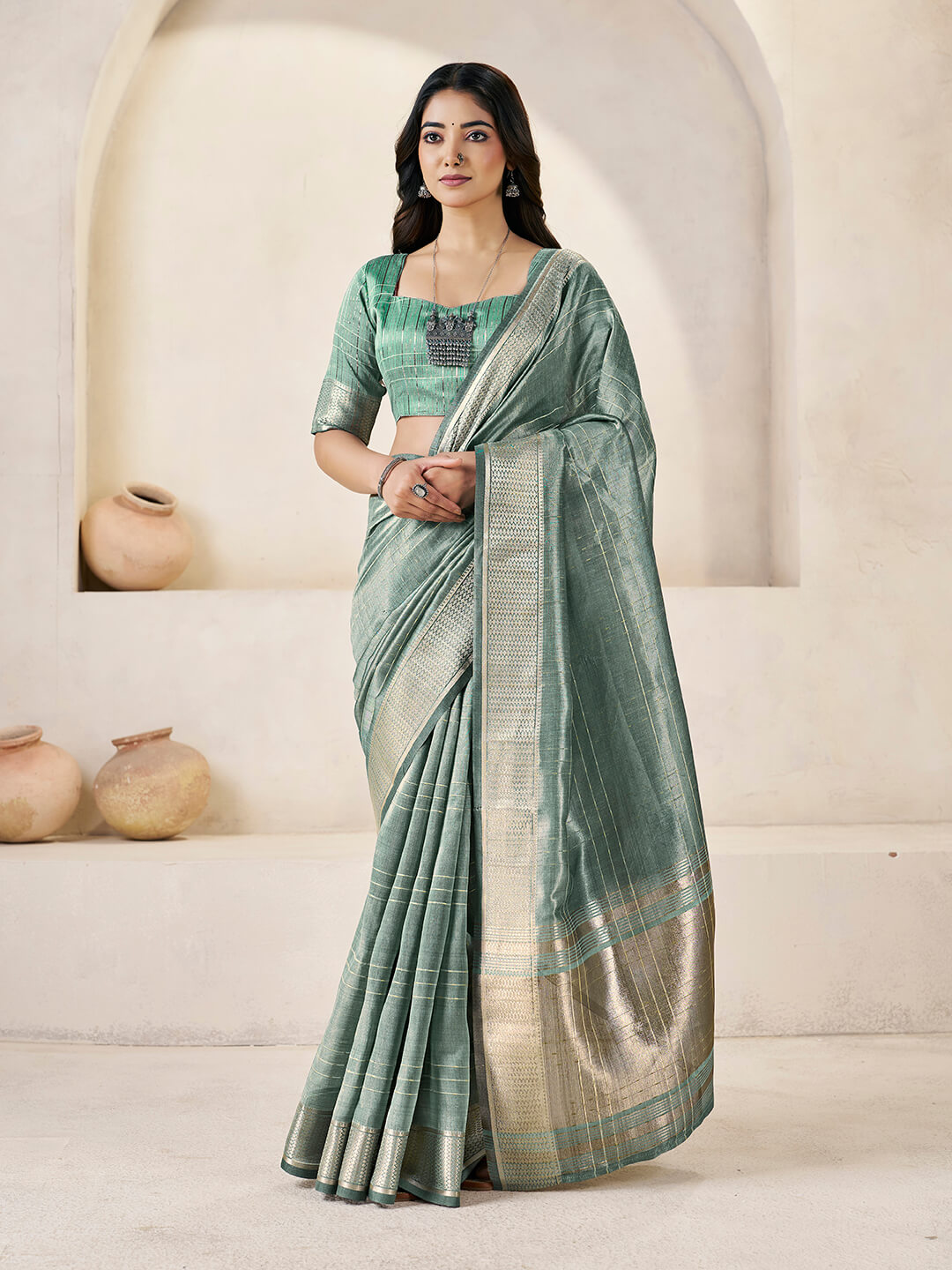 Entrancing Green Zari Weaving Linen Silk Saree With Invaluable Blouse Piece