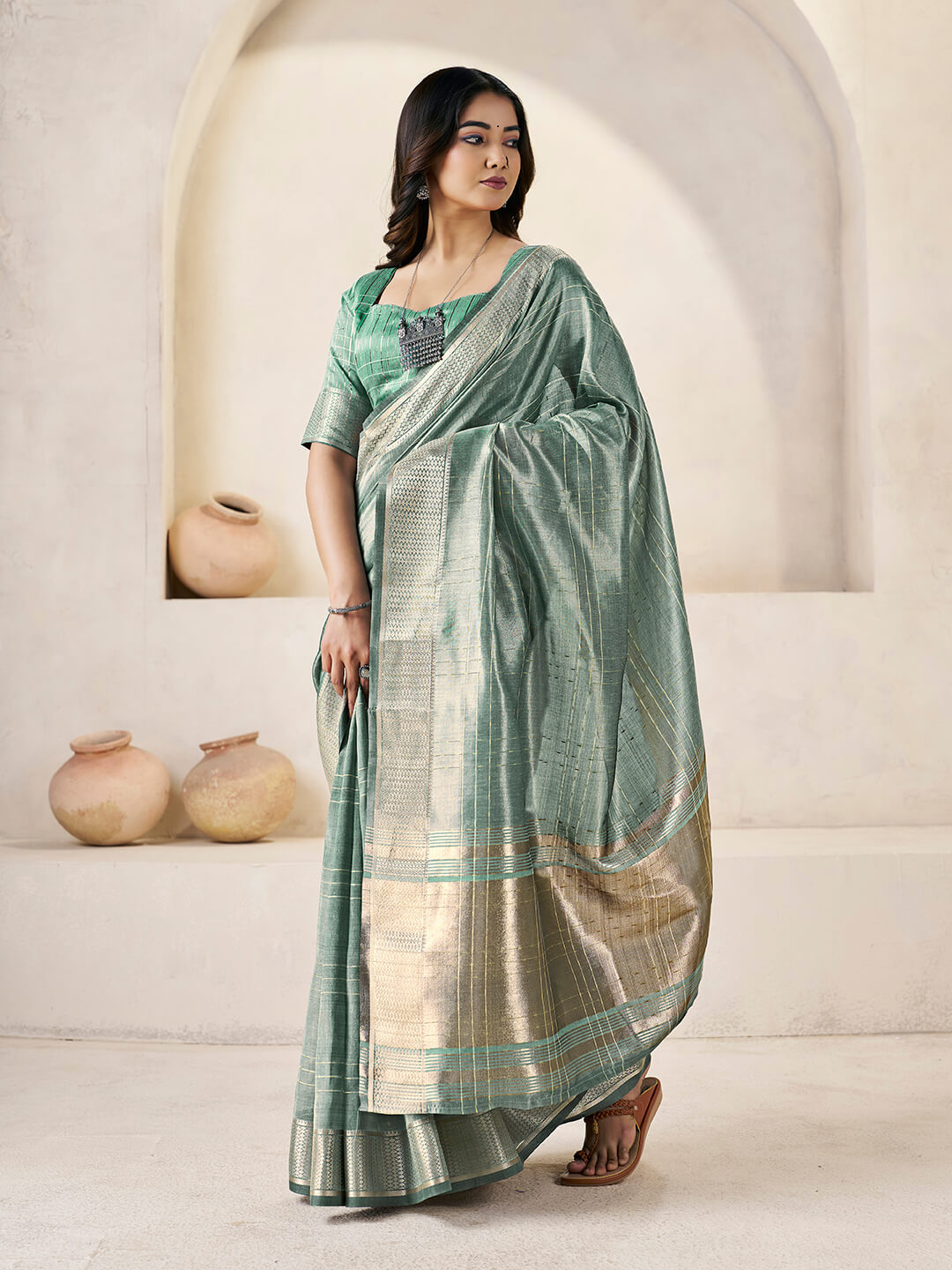 Entrancing Green Zari Weaving Linen Silk Saree With Invaluable Blouse Piece