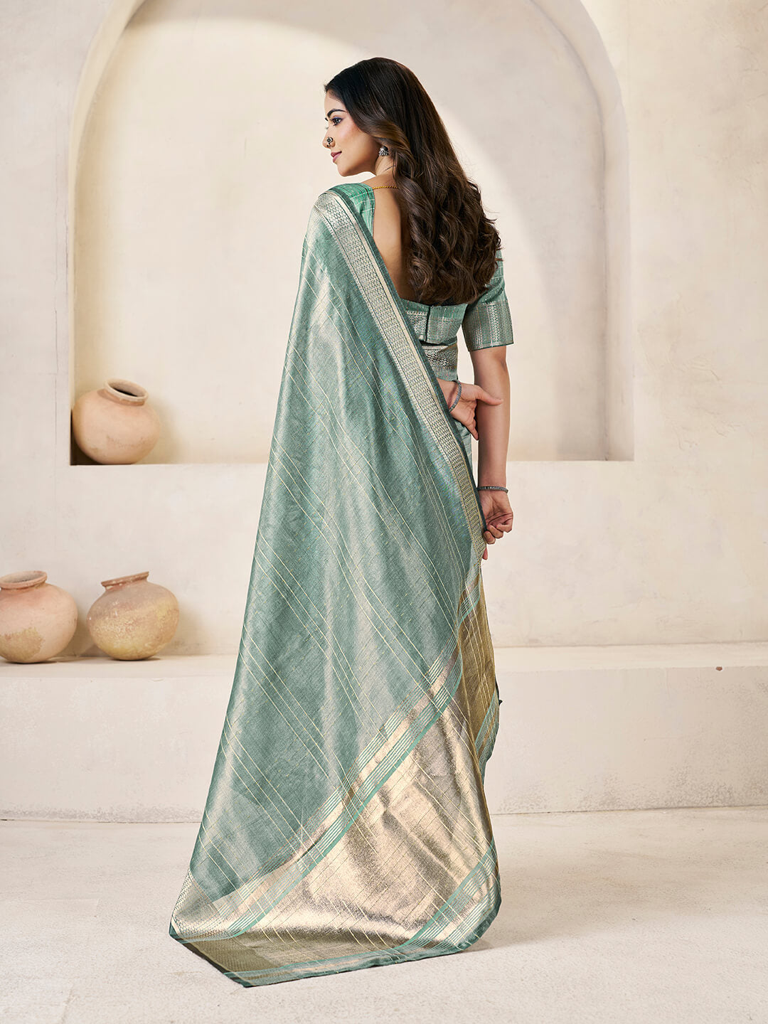 Entrancing Green Zari Weaving Linen Silk Saree With Invaluable Blouse Piece