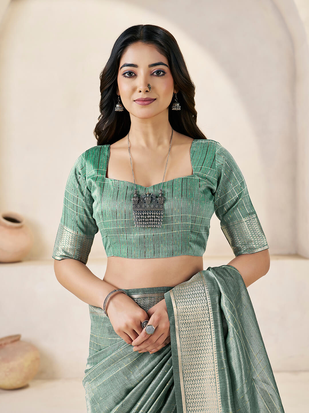 Entrancing Green Zari Weaving Linen Silk Saree With Invaluable Blouse Piece