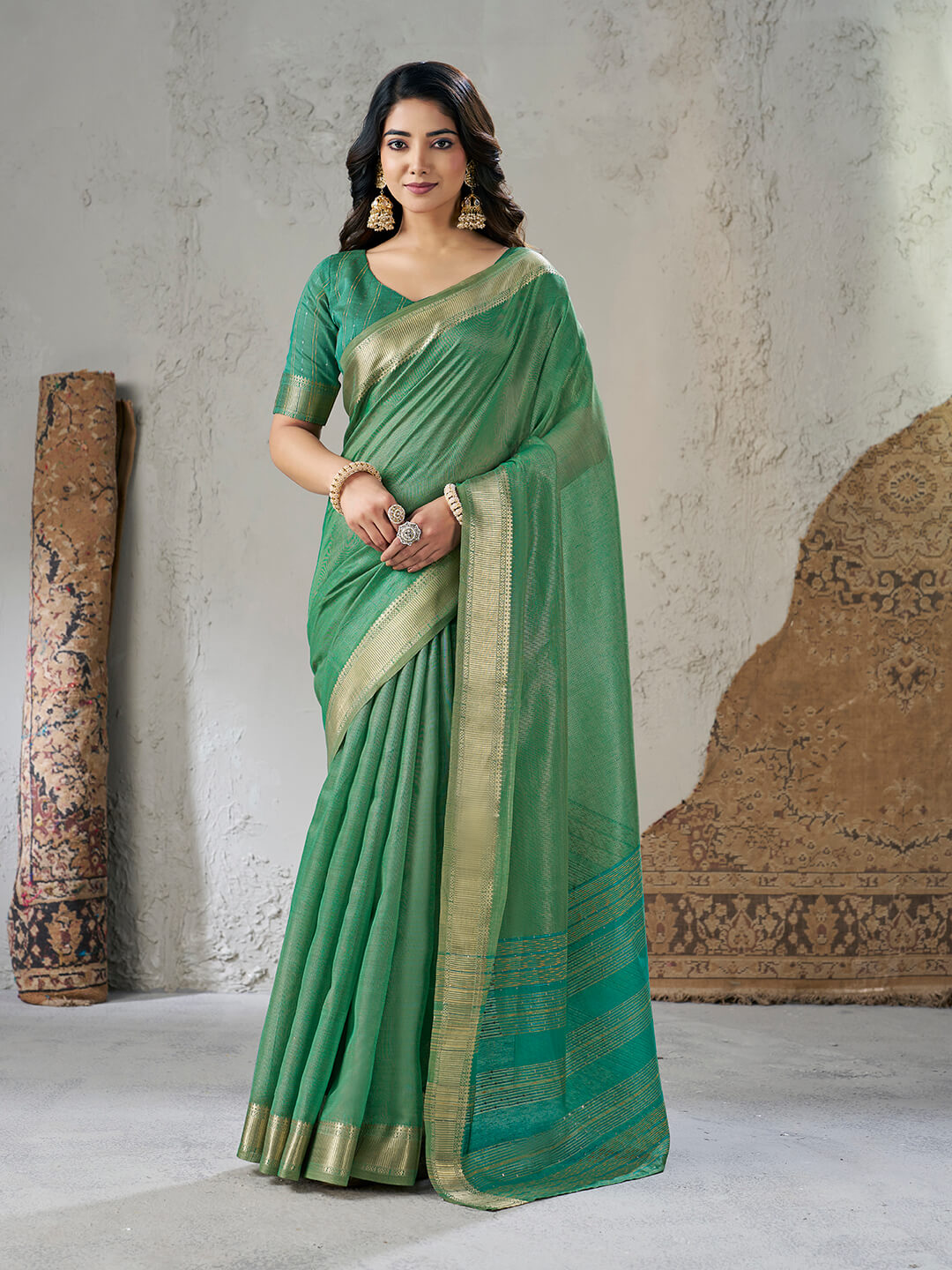 Artistic Green Zari Weaving Linen Silk Saree With Dazzling Blouse Piece