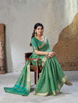 Artistic Green Zari Weaving Linen Silk Saree With Dazzling Blouse Piece