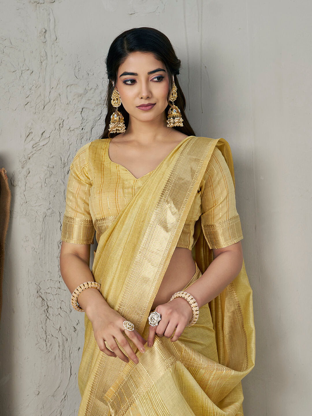Amiable Yellow Zari Weaving Linen Silk Saree With Twirling Blouse Piece
