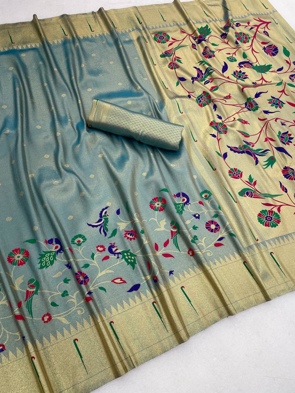 Entrancing Sky Tissue Silk Paithani Saree With Invaluable Blouse Piece