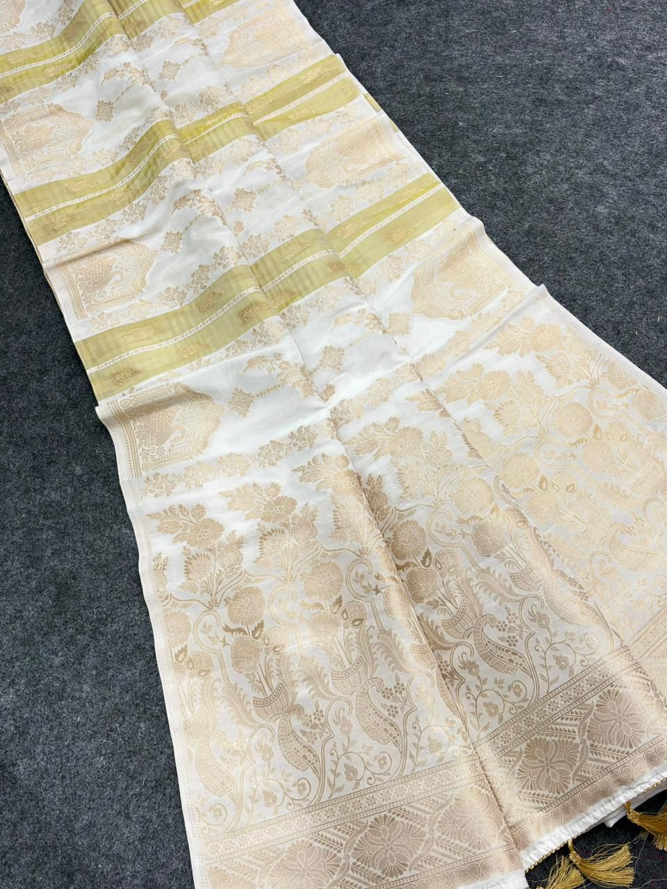 Susurrous Beige Banarasi Tissue Silk Saree With Enticing Blouse Piece