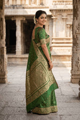 Adorning Green Pure Zari Weaving Banarasi Silk Saree With Pulsating Blouse Piece