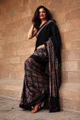 Divine Black Ajrakh Printed Mirror Work Satin Silk Saree With Vibrant Blouse Piece