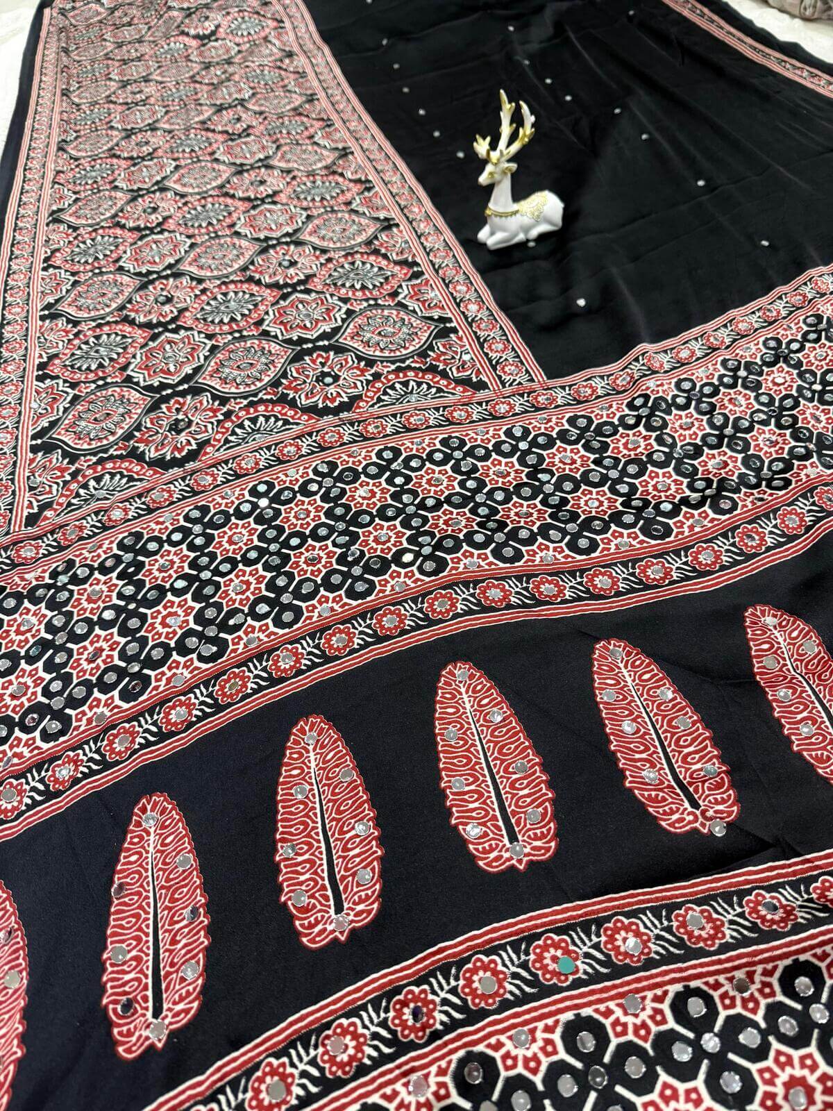 Divine Black Ajrakh Printed Mirror Work Satin Silk Saree With Vibrant Blouse Piece