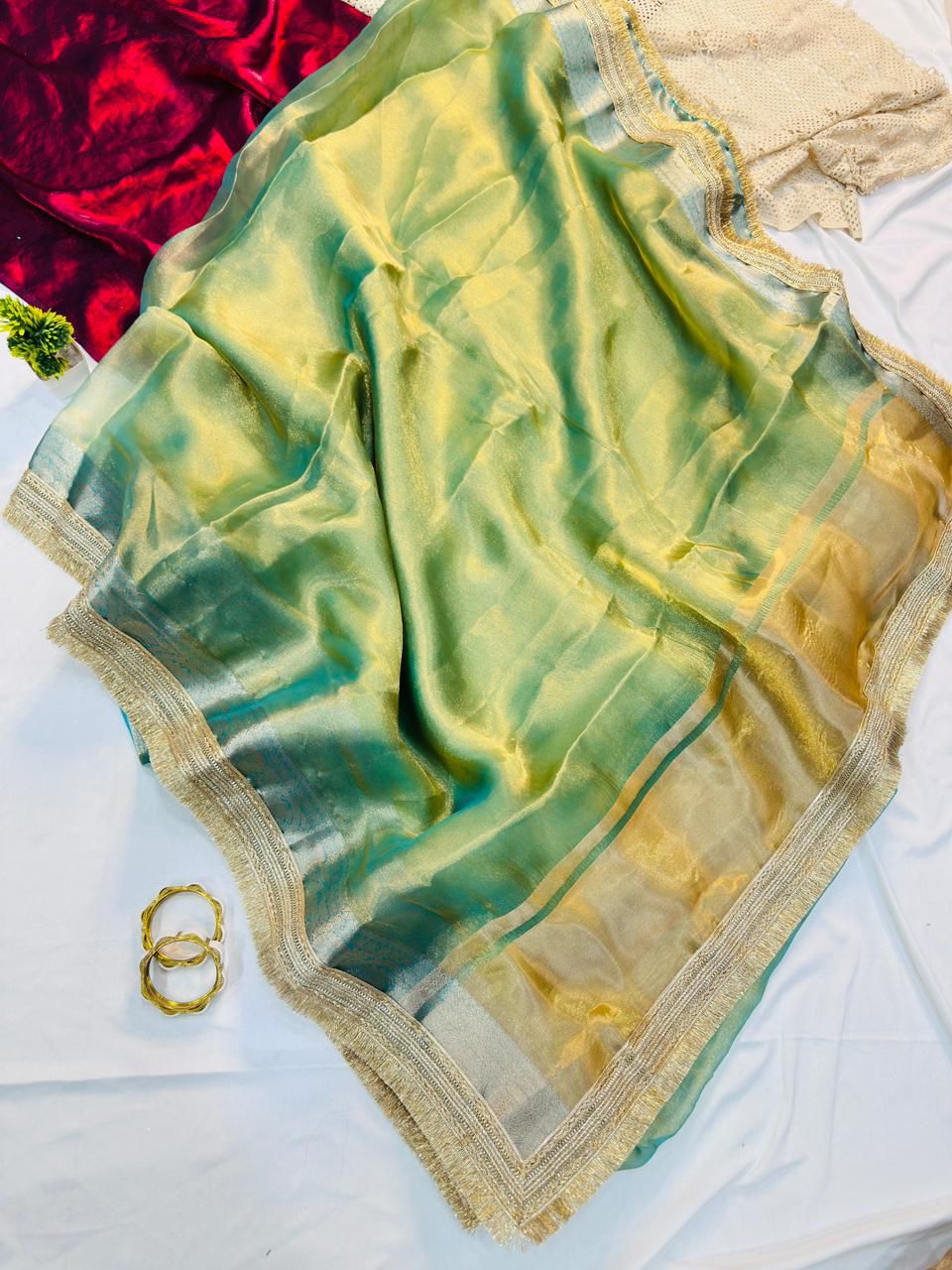 Sizzling Pista Tissue Silk Saree With Vestigial Blouse Piece
