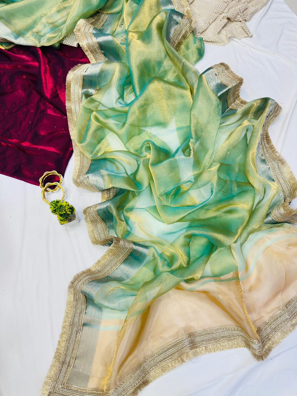 Sizzling Pista Tissue Silk Saree With Vestigial Blouse Piece