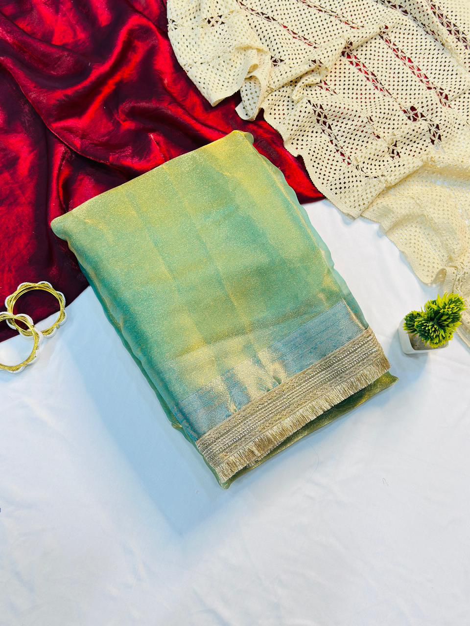 Sizzling Pista Tissue Silk Saree With Vestigial Blouse Piece