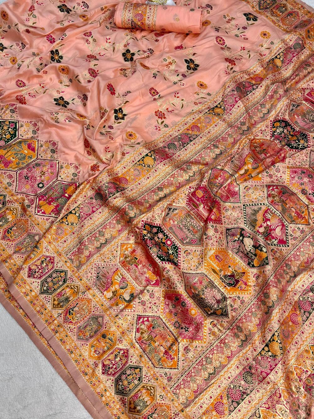 Capricious Peach Pashmina Silk Saree With Nebula Blouse Piece