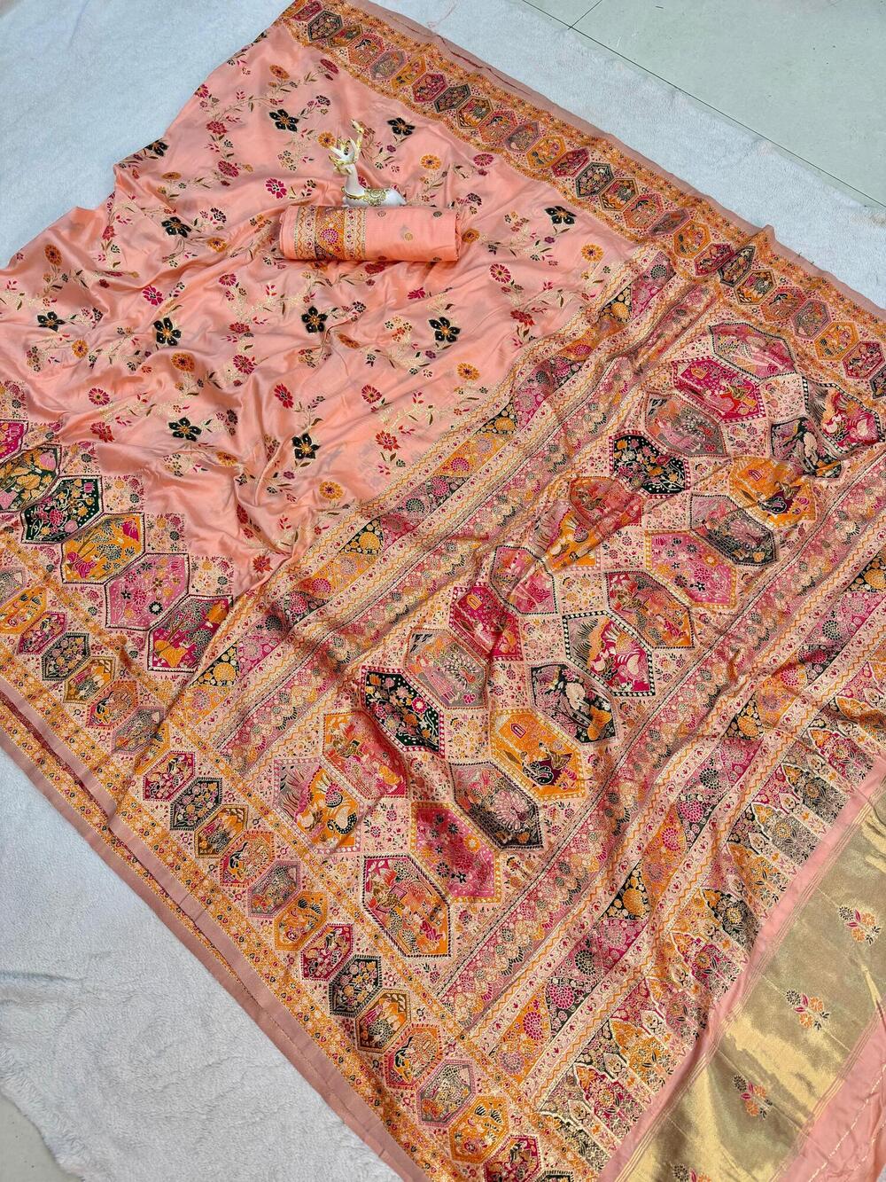 Capricious Peach Pashmina Silk Saree With Nebula Blouse Piece
