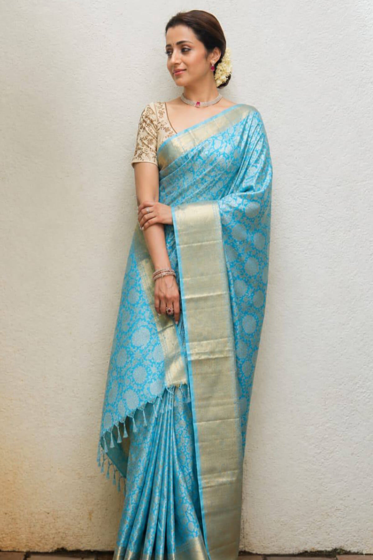 Sophisticated Firozi Kanjivaram Tissue Silk Saree With Scintillating Blouse Piece