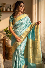 Sophisticated Firozi Kanjivaram Tissue Silk Saree With Scintillating Blouse Piece