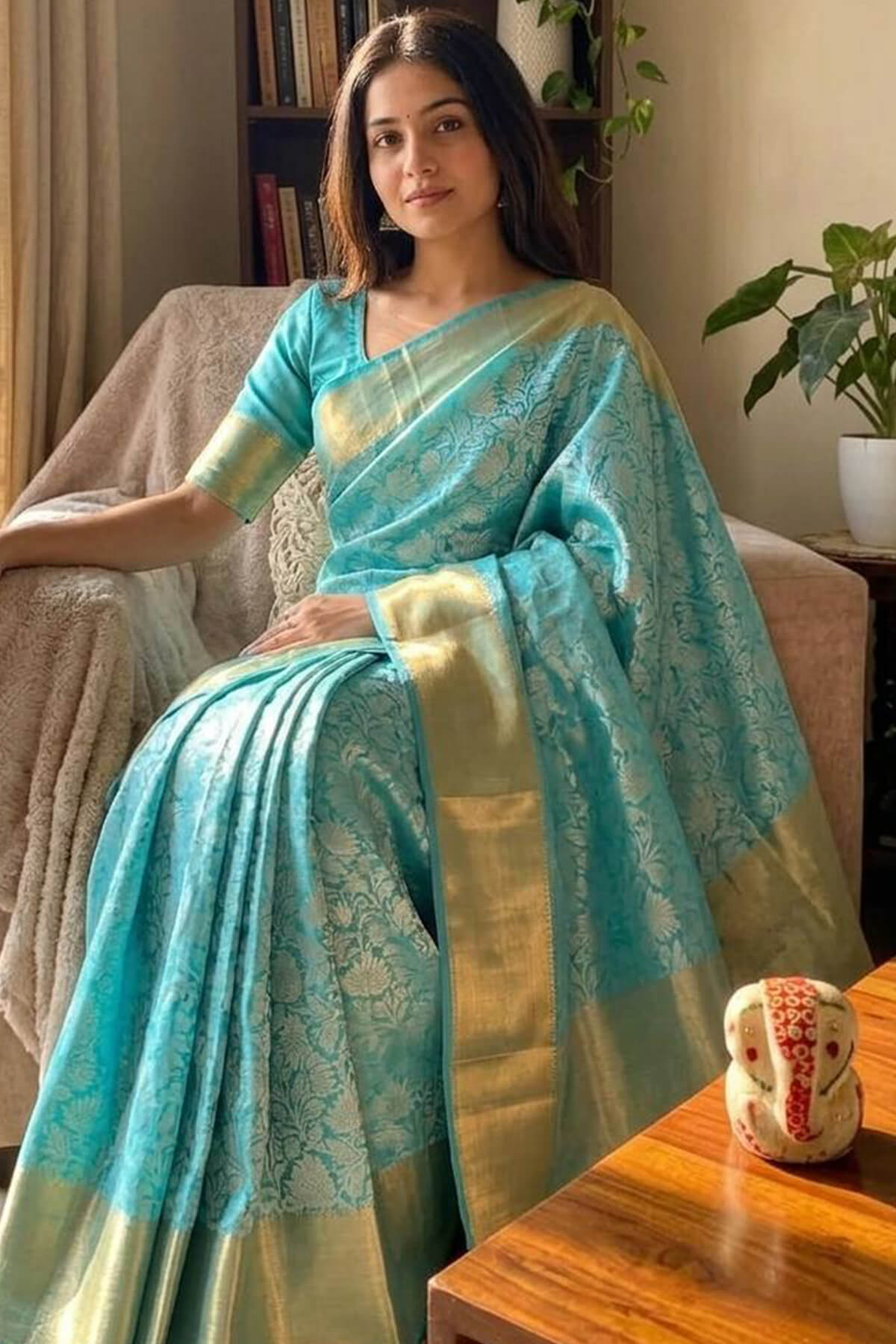 Sophisticated Firozi Kanjivaram Tissue Silk Saree With Scintillating Blouse Piece