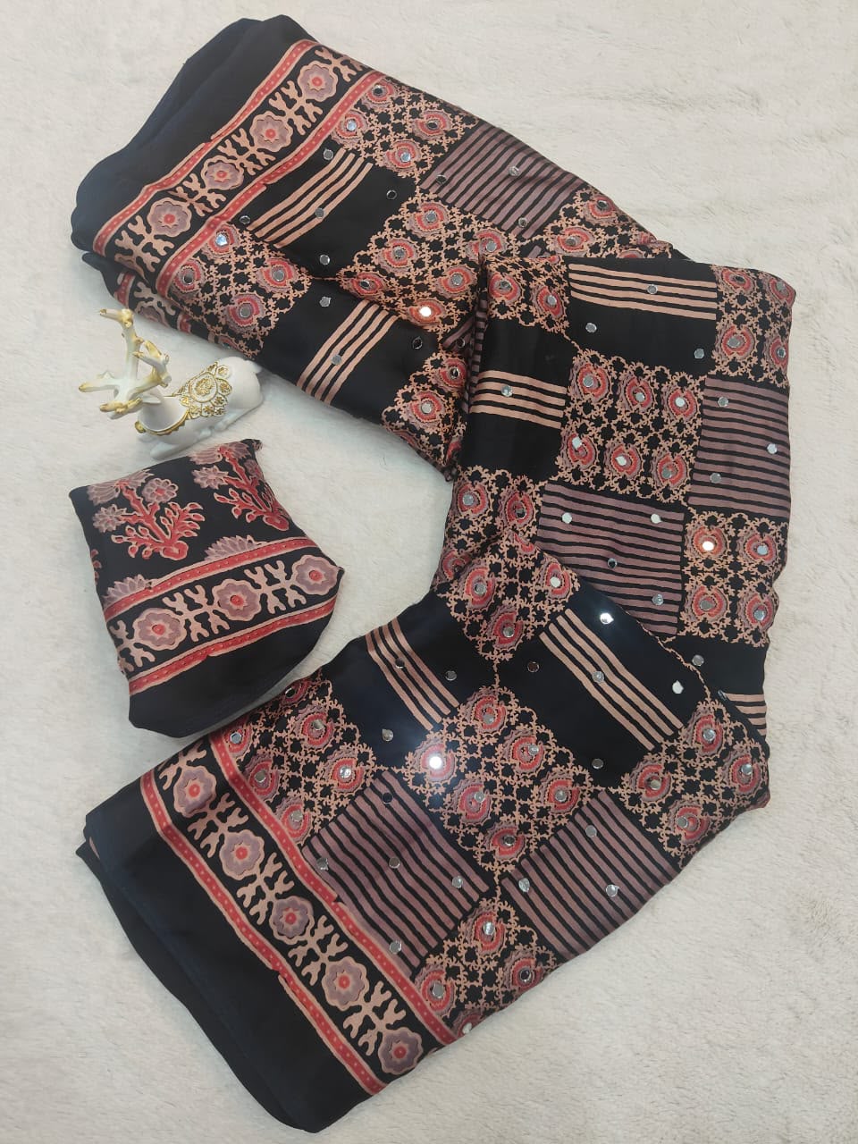 Lissome Black Ajrakh Printed Mirror Work Satin Silk Saree With Inspiring Blouse Piece