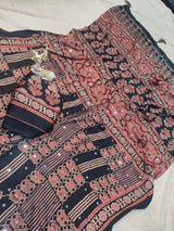 Lissome Black Ajrakh Printed Mirror Work Satin Silk Saree With Inspiring Blouse Piece