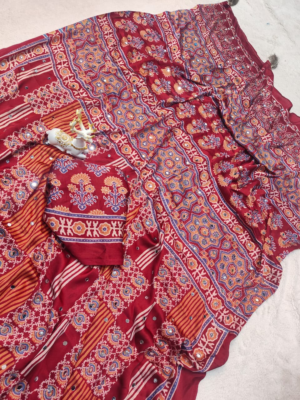 Majestic Maroon Ajrakh Printed Mirror Work Satin Silk Saree With Dazzling Blouse Piece