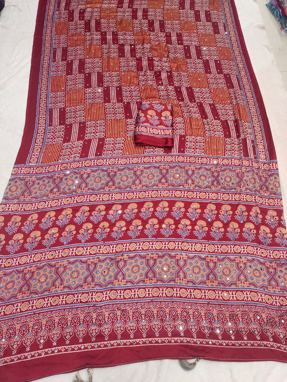Majestic Maroon Ajrakh Printed Mirror Work Satin Silk Saree With Dazzling Blouse Piece