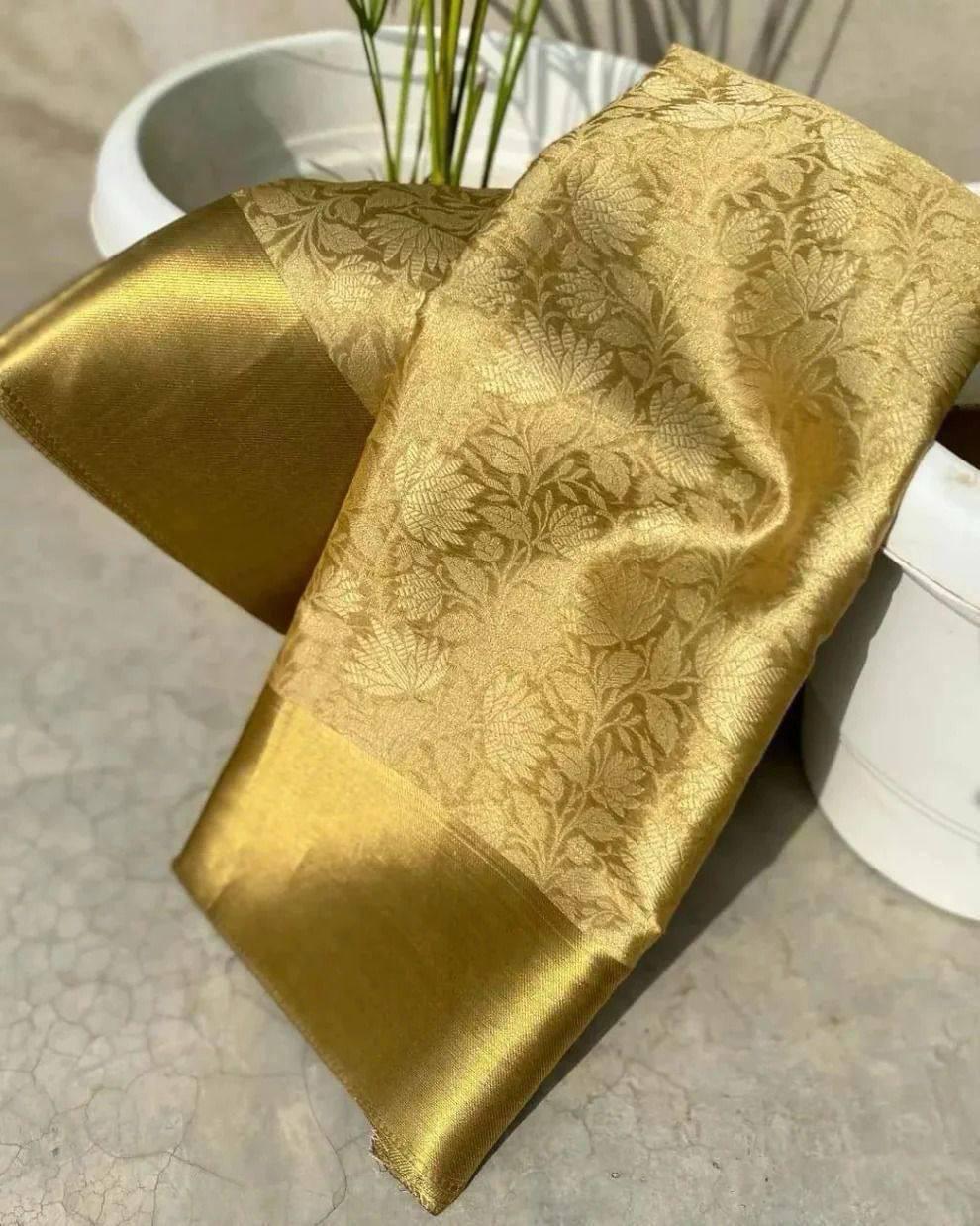 Engaging Golden Soft Tissue Silk Saree With Prodigal Blouse Piece