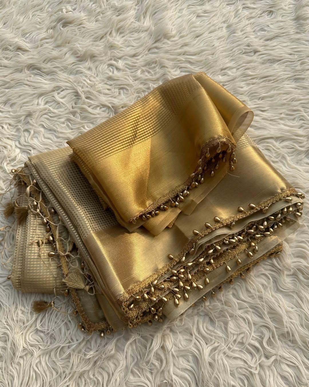 Fancifull Golden Soft Tissue Silk Saree With Demesne Blouse Piece