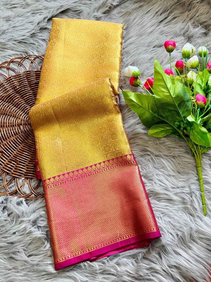 Bollywood Style Golden Soft Tissue Silk Saree With Artistic Blouse Piece