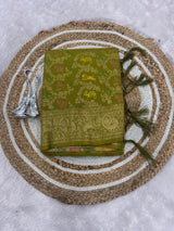 Cynosure Green Soft Banarasi Silk Saree With Precious Blouse Piece