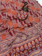Desiring Maroon Ajrakh Printed Dola Silk Saree With Classic Blouse Piece