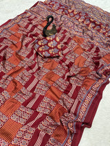 Desiring Maroon Ajrakh Printed Dola Silk Saree With Classic Blouse Piece