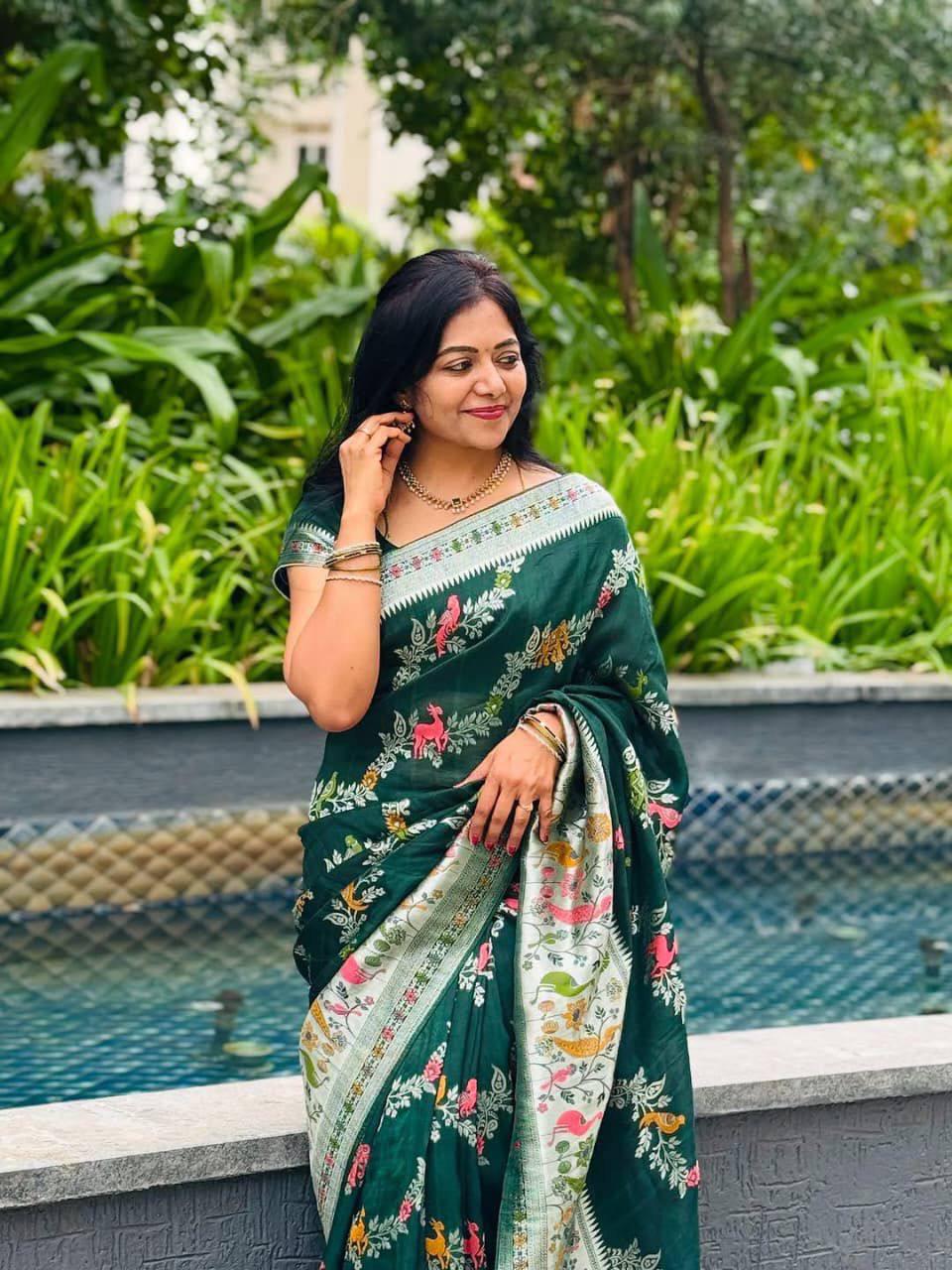 Divine Green Soft Banarasi Silk Saree With Dulcet Blouse Piece