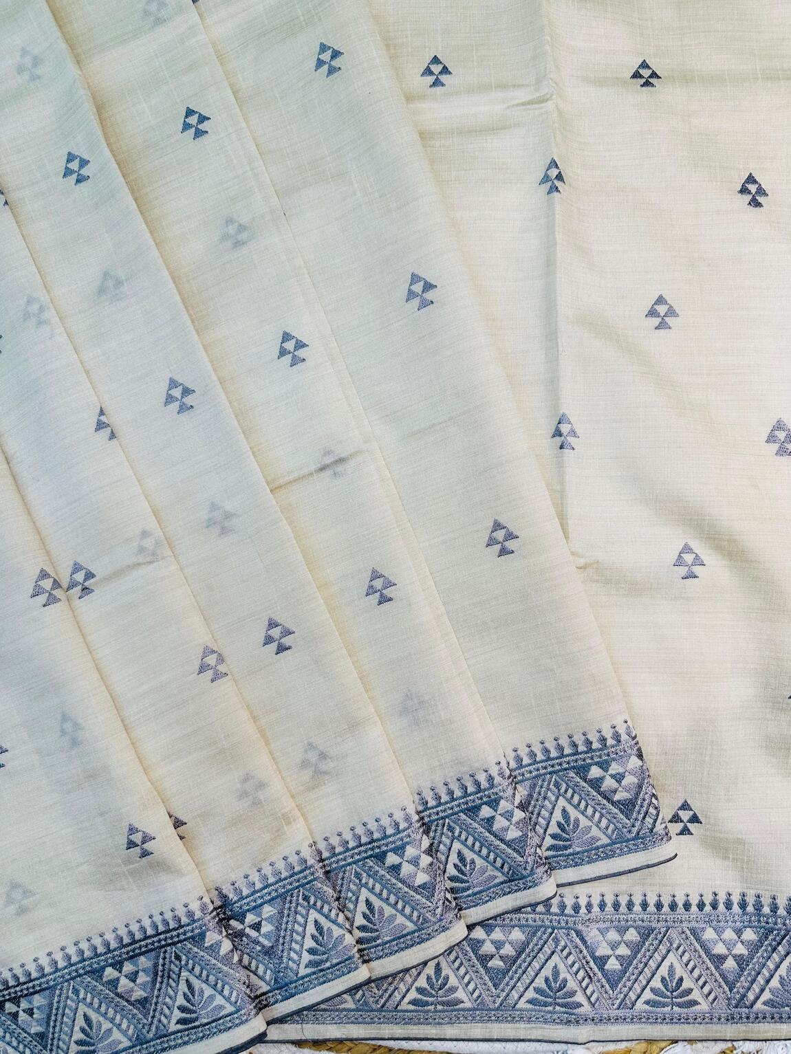 Cynosure Off White Embroidery Work Tussar Silk Saree With Smart Blouse Piece