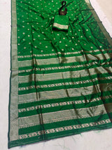 Exemplary Dark Green Pure Zari Weaving Banarasi Silk Saree With Tantalizing Blouse Piece