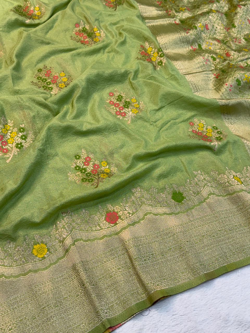 Grandiose Green Banarasi Georgette Silk Saree With Stunner Blouse Piece