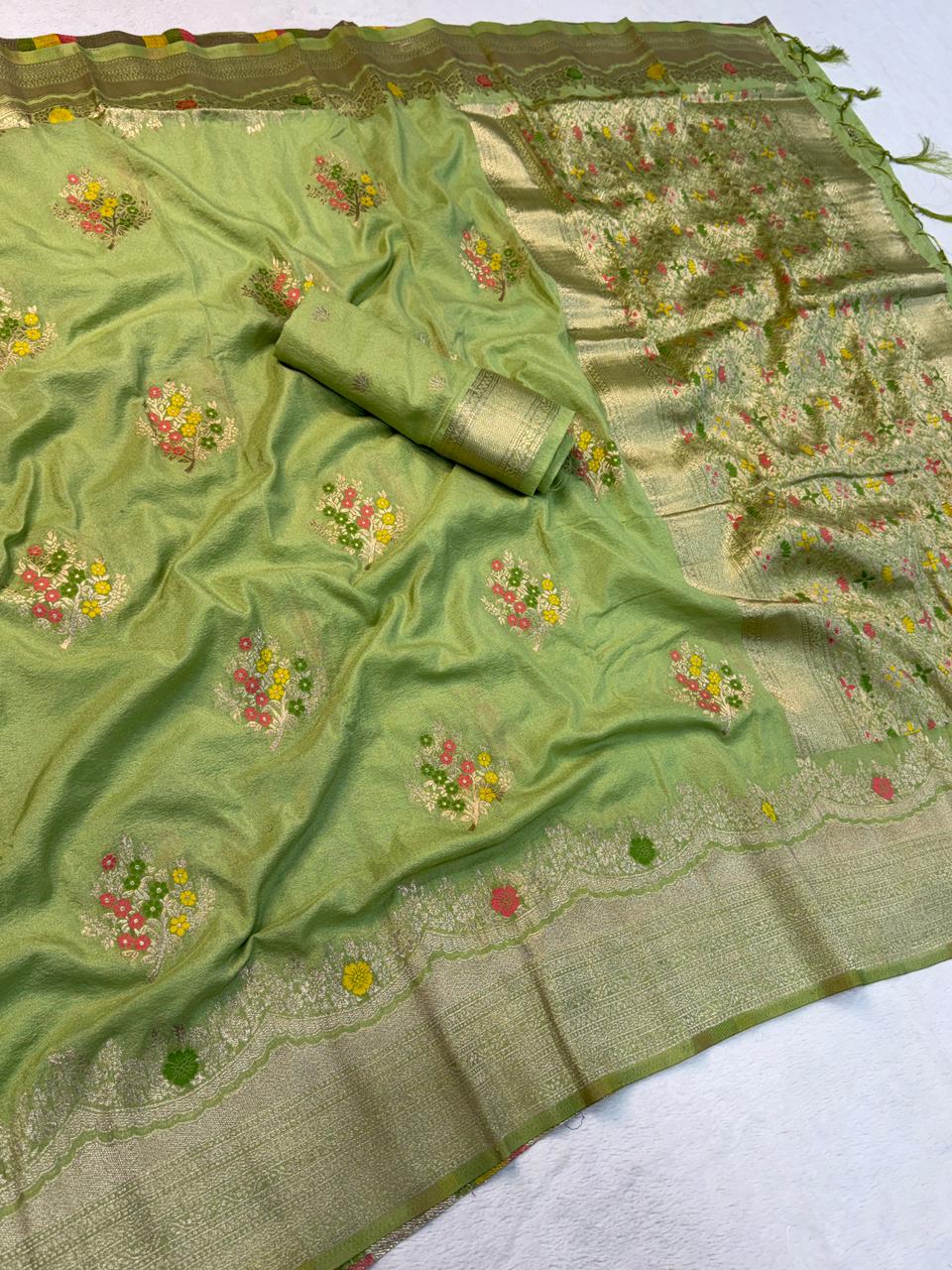 Grandiose Green Banarasi Georgette Silk Saree With Stunner Blouse Piece