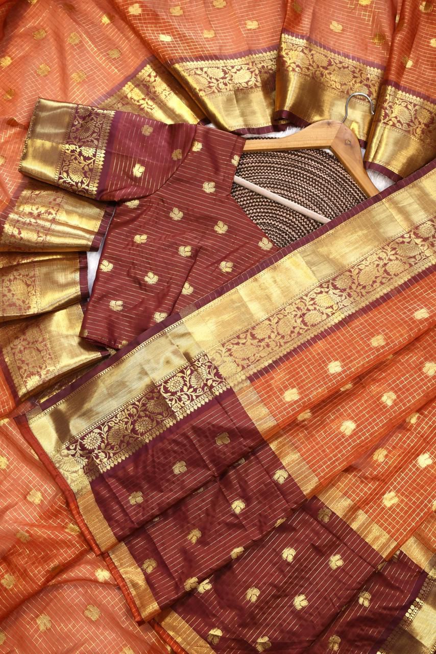 Entrancing Orange Banarasi Tissue Silk Saree With Ephemeral Blouse Piece