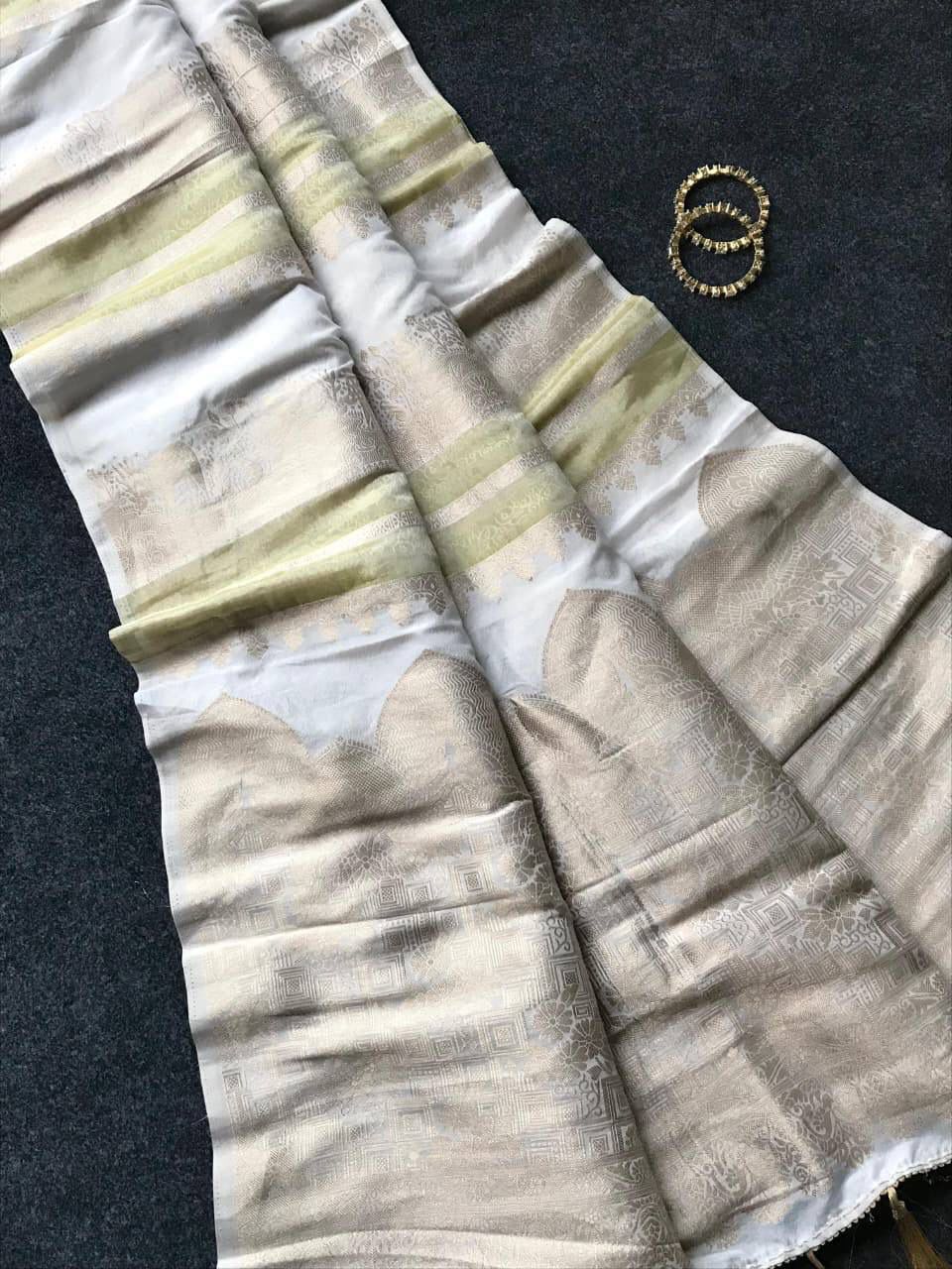 Exemplary Beige Banarasi Dola Silk Saree With Aplomb Blouse Piece