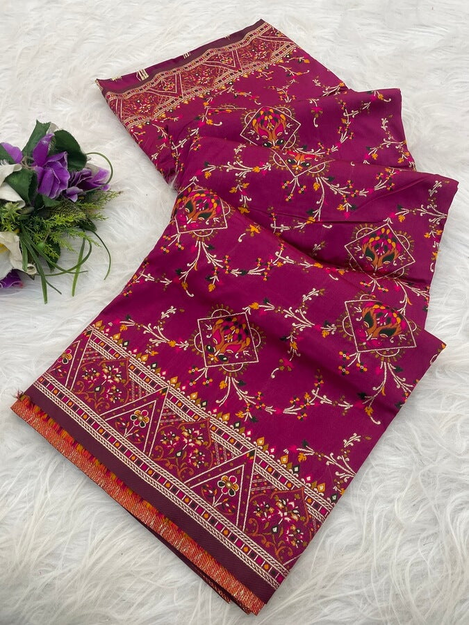Glittering Dark Pink Pashmina Saree With Demanding Blouse Piece