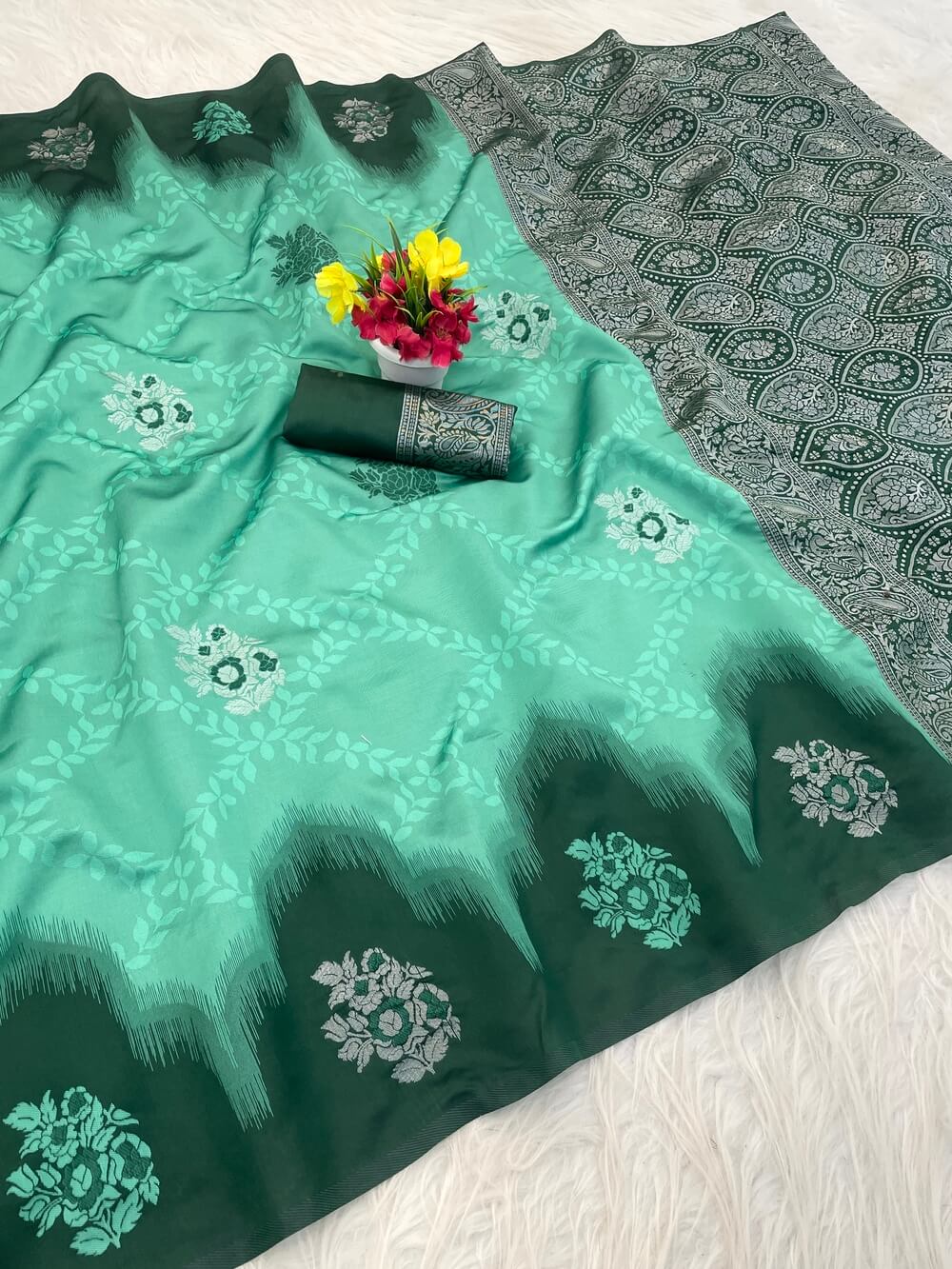 Delightful Sea Green Soft Silk Saree With Gleaming Blouse Piece