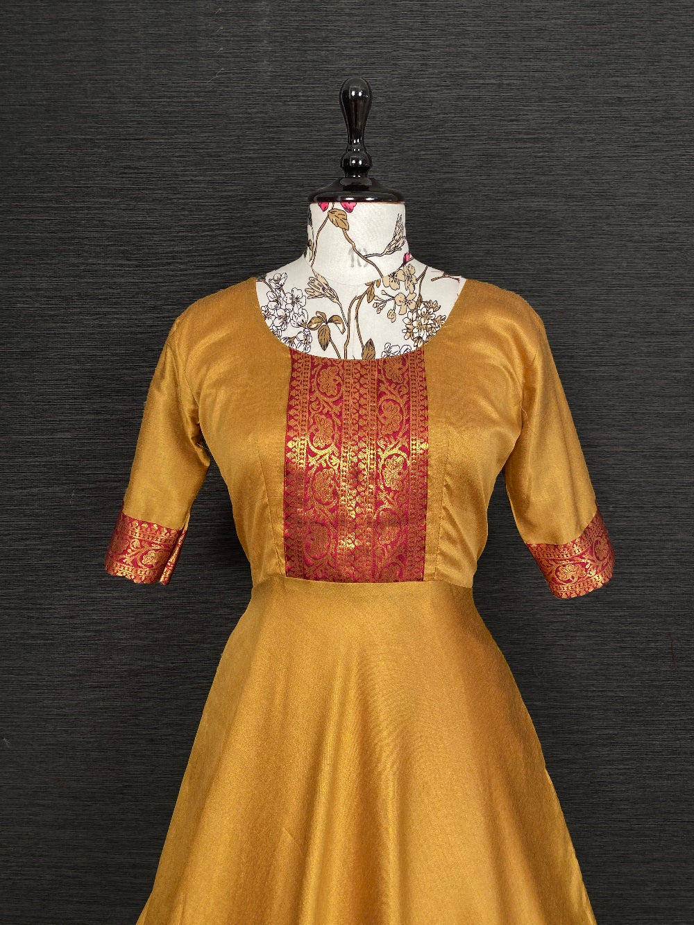 Mustard Color Beautiful Weaving Zari Worked Silk Gown