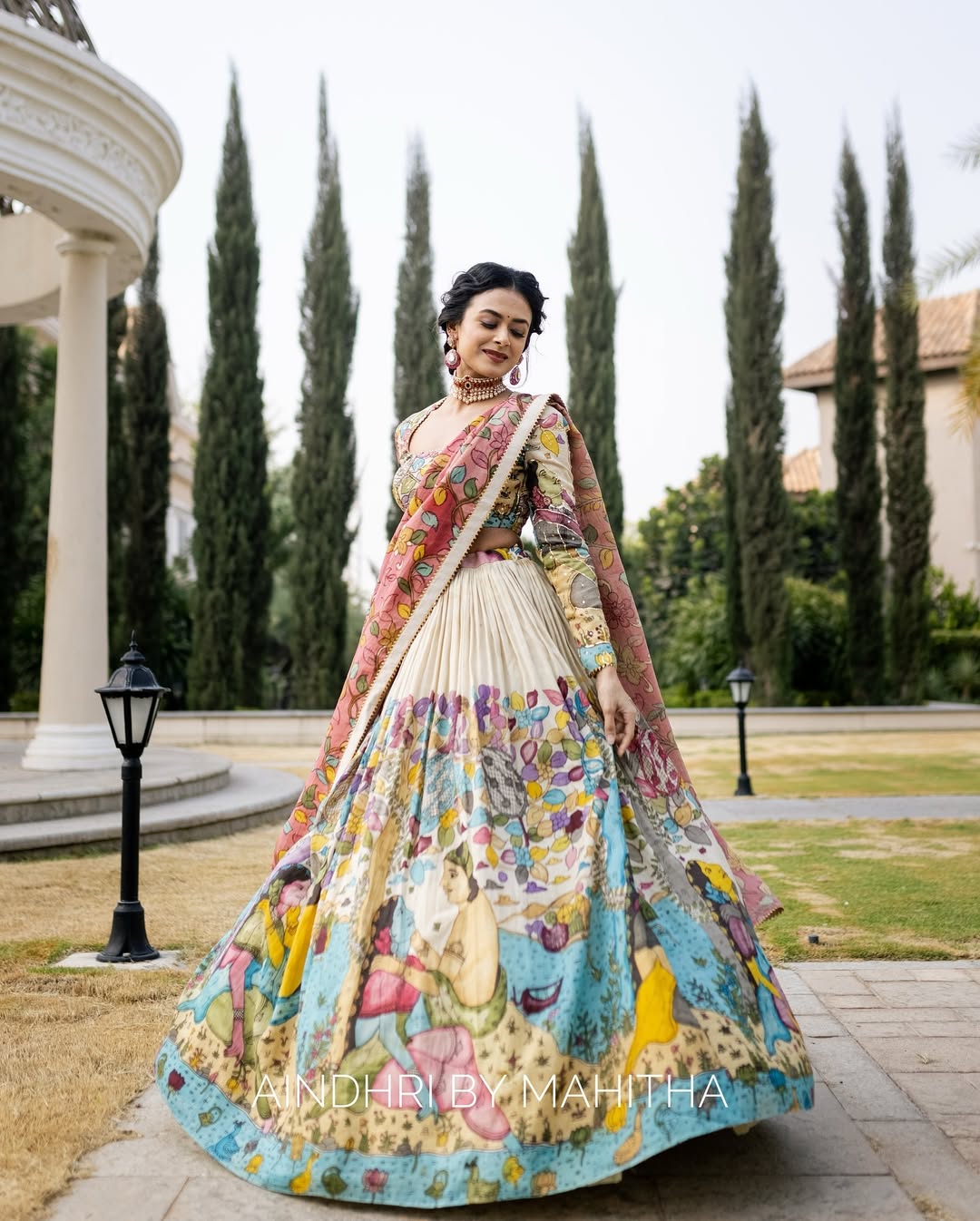 Kalamkari lehenga with vibrant mythological artwork ideal for weddings special occasions