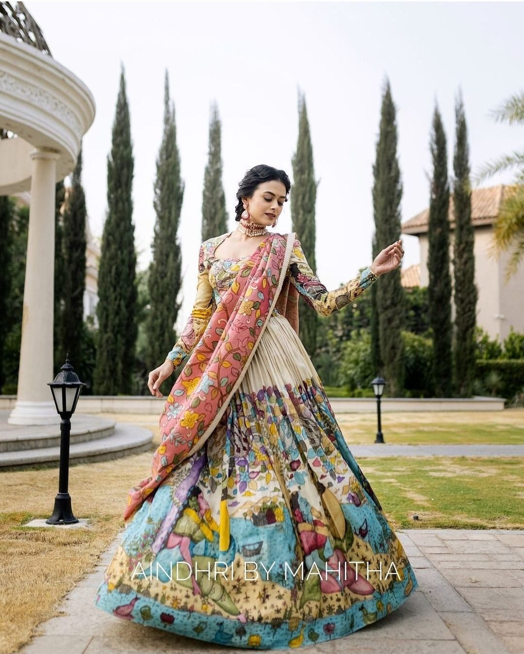 Kalamkari lehenga with vibrant mythological artwork ideal for weddings special occasions