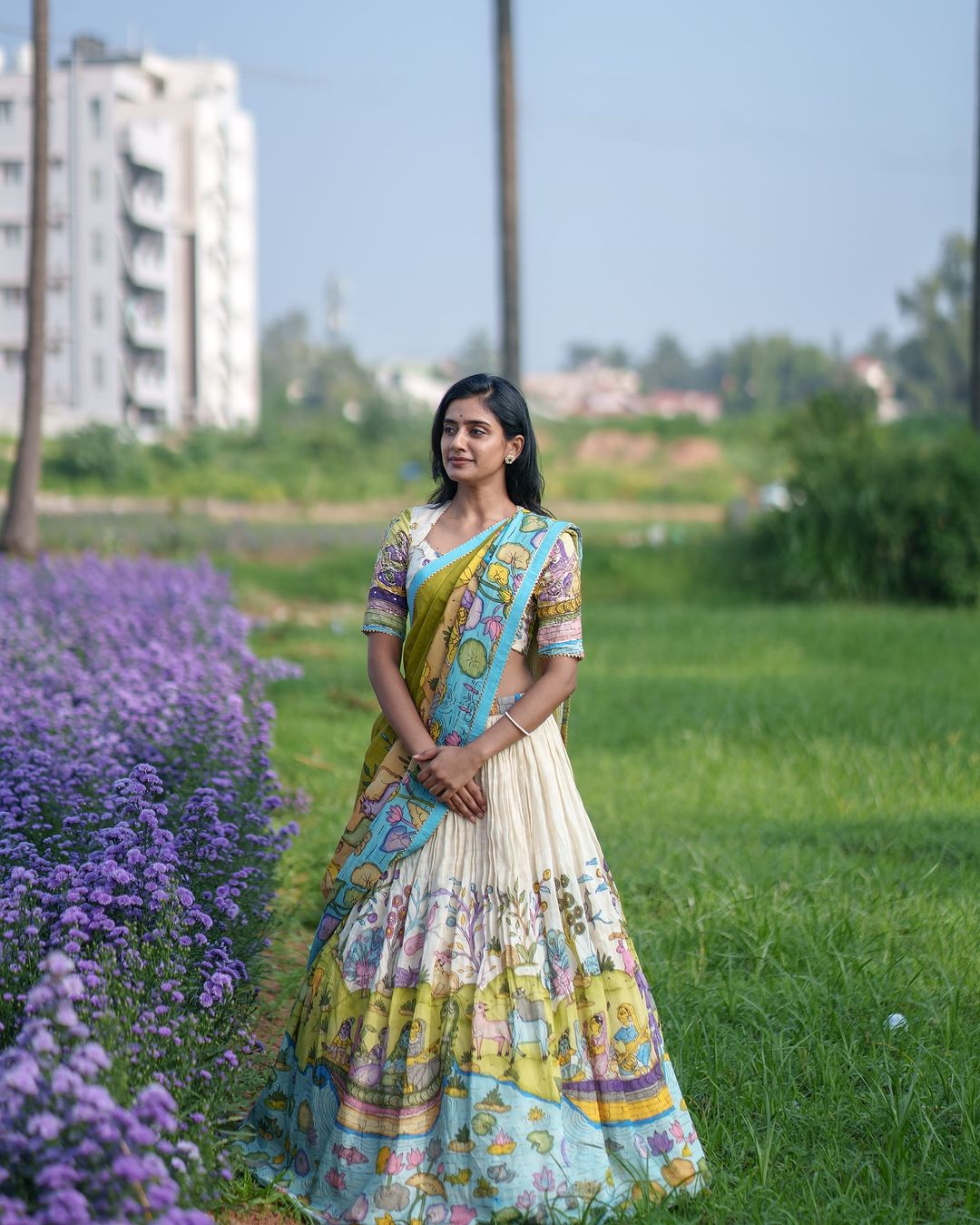 Cream and mustard kalamkari lehenga with pastoral motif and blue border mameraa