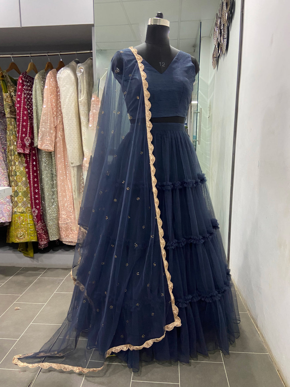 Soft Net Navy Blue Plain Ruffle Lehenga Choli