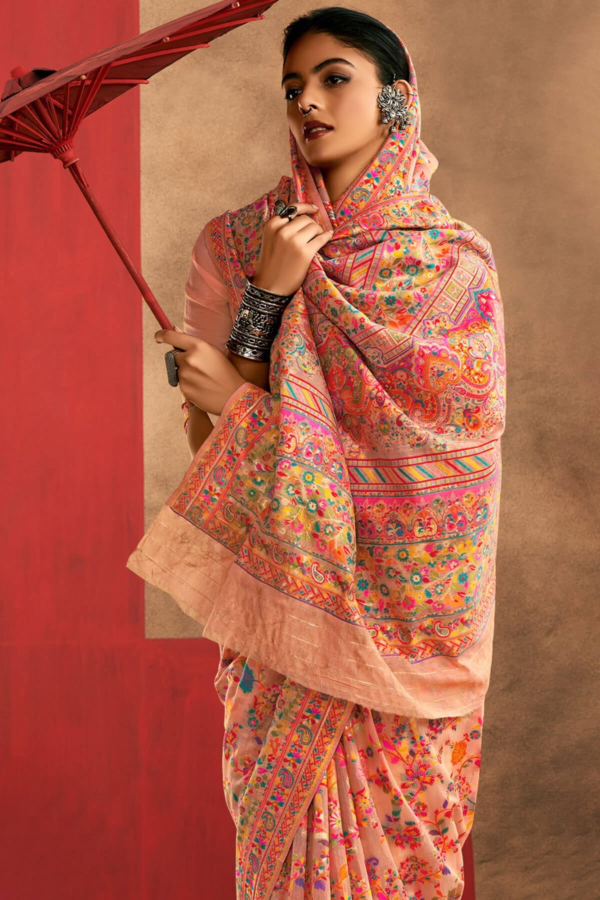 Delectable Peach Pashmina Saree With Panache Blouse Piece